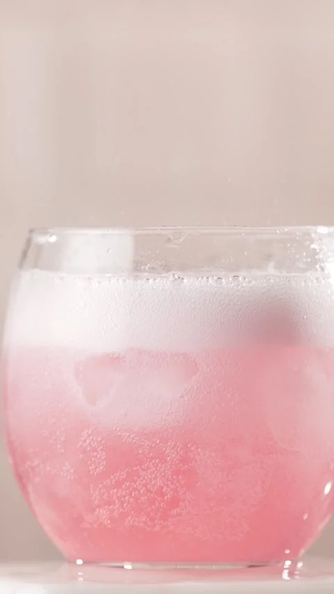 Bubbles on the surface of the cocktail, macro shot. Stock Footage 311004105