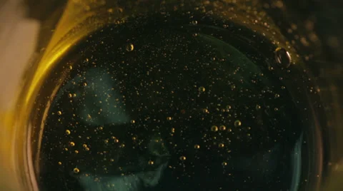 Bubbles suspended in moving liquid Video stock 37920830