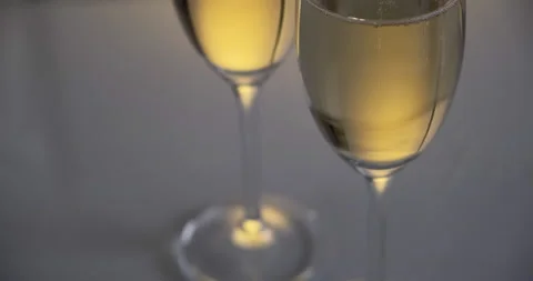 Bubbles in two glasses of champagne close up. Stock Footage 141774040