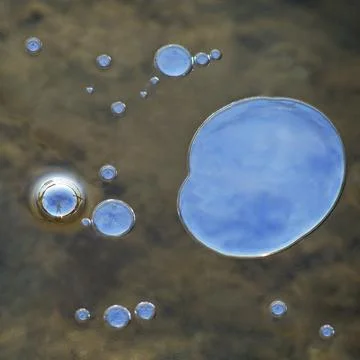Bubbles under ice Stock Photos