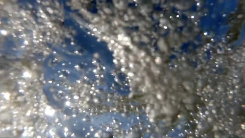 Bubbles under swirled and rough water Stock Footage 118009859