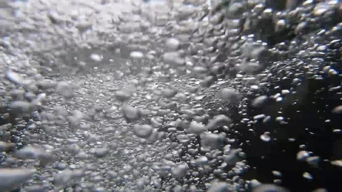 Bubbles under water in a mountain river Stock Footage 105253193