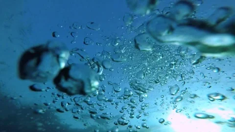 Bubbles underwater in slow motion Stock Footage 125123070