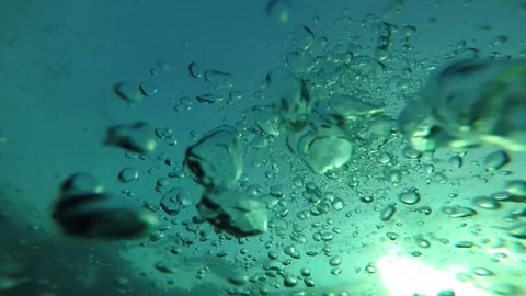Bubbles underwater in slow motion Stock Footage 125651320