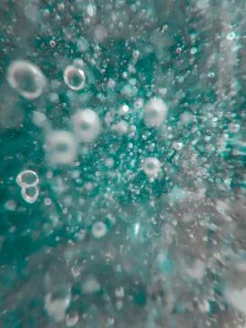 Bubbles in water. Abstract background Photos