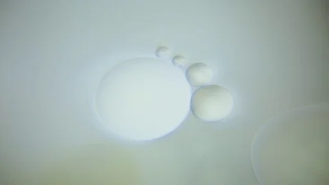 Bubbles in water against grey background Stock Footage 76103038