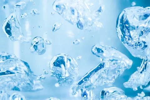 Bubbles in the water close-up. Beautiful splashes of liquid. Stock Photos
