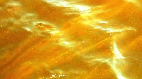 Bubbles of water on the sunny beach Stock Footage 66426767