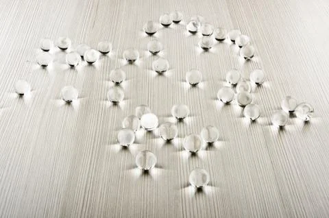 Bubbles on the wooden table Stock Photos