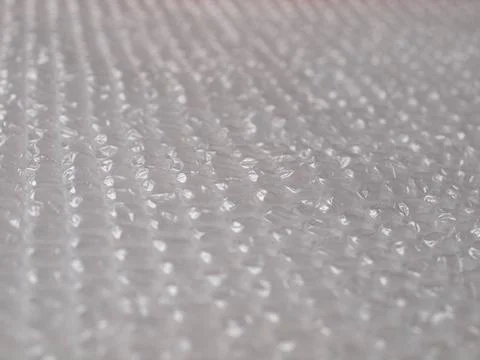 Bubblewrap Bubble wrap sheet useful as a background - selective focus Copy... Stock Photos
