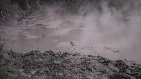 Bubbling and Boiling Mud Pools in Wai-O-Tapu Outside of Rotorua, New Zealand Stock Footage 71380680