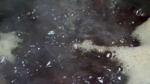 Bubbling boiling Stock Footage 77689237