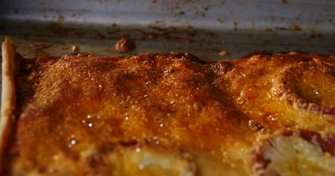 Bubbling cheese pizza slow zoom into hot oven starting to burn Stock-Footage 150718902