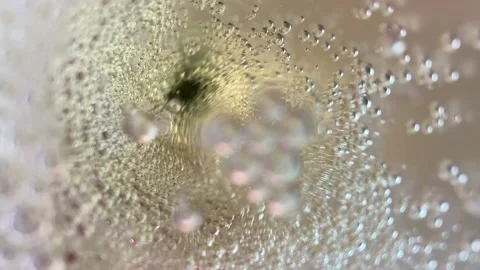 Bubbling Clear Alcoholic Drink Macro Stock Footage 155154561
