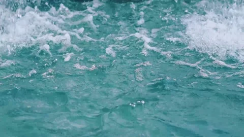 Bubbling clear water with spray and foam. fountain with water. slow motion video Stock Footage 161080673