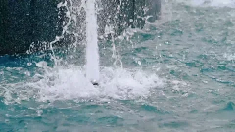 Bubbling clear water with spray and foam. fountain with water. slow motion video Stock Footage 161107796