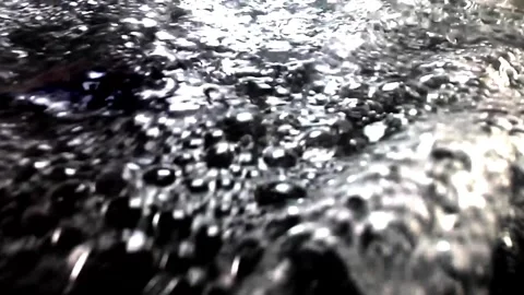 Bubbling Dark Water Submergence Swells and Percolates Stock Footage 245560346