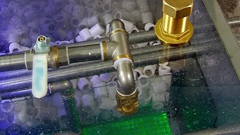 Bubbling Green Current Purifies Air Within a Hydro Filter System Stock Footage 341067130