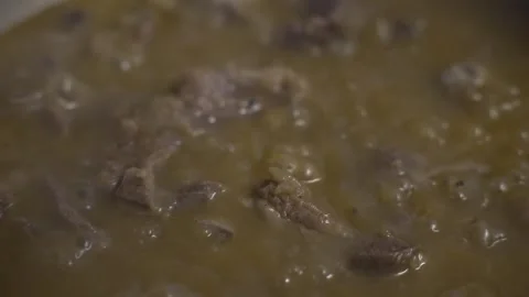 Bubbling Meat Beef Curry In Pot With Steam Rising Off. Closeup Shot Stock Footage 271342724