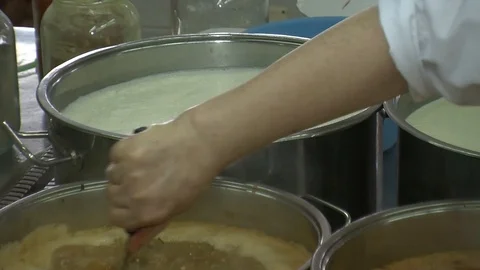 Bubbling meat soup, inside a metal pot, at a restaurant kitchen 動画素材 90225548