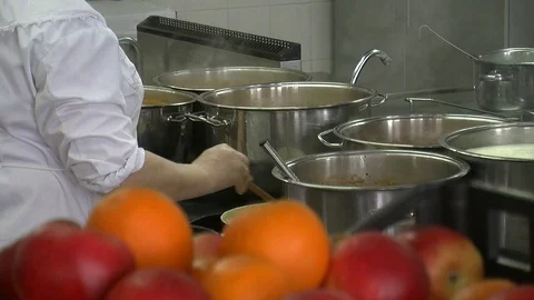 Bubbling meat soup, inside a metal pot, at a restaurant kitchen 動画素材 90229067