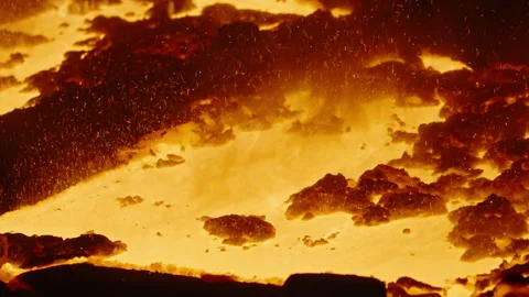 Bubbling Molten Lava Surface with Flying Sparks Stock Footage 346225574