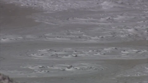 Bubbling Mud Pit in Yellowstone National Park Stock Footage 86756536