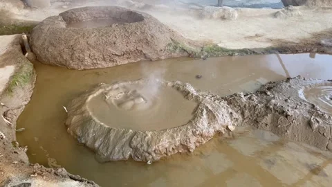 Bubbling Mud Pool at Beppu Jigoku Hell Tour, Oita, Japan Stock Footage 337977645