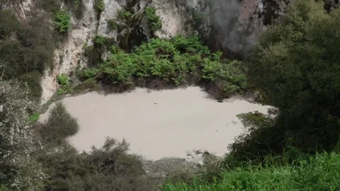 Bubbling mud pool, Craters of the Moon, Taupo, New Zealand Stock Footage 320606430