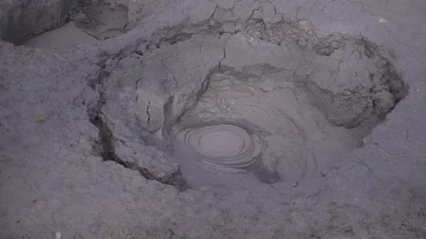 A bubbling mud volcano in the caldera of the Uzon Kamchatka volcano. Stock Footage 140824010