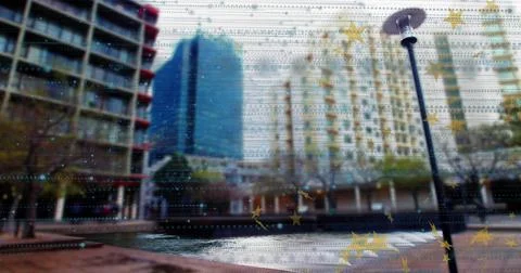 Bubbling rectangular fountain pool shining in city plaza, with black lamppost Stock Photos