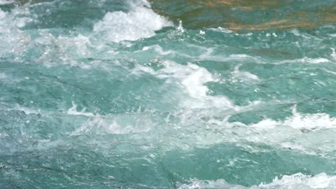 A bubbling river. Slow motion. Close-up. Video stock 138132306