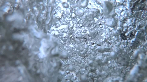 Bubbling spa, spring thermal water. Flowing beneath water surface. 库存影片 121463079