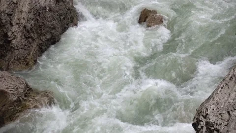Bubbling stream of a mountain river Video stock 168184382