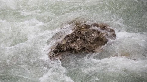Bubbling stream of water in a mountain river, close up. Slow motion 180 fps Stock Footage 168178246