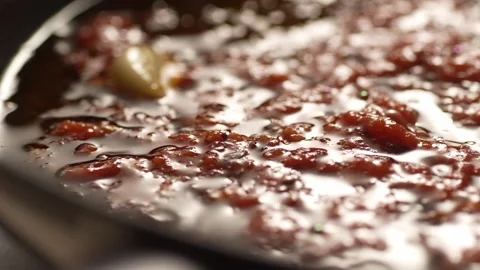 Bubbling tomato sauce close-up. Stock Footage 266900330