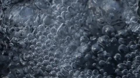 Bubbling water with air bubbles. Cavitation of water flow. Water texture. Stock Footage 337725422