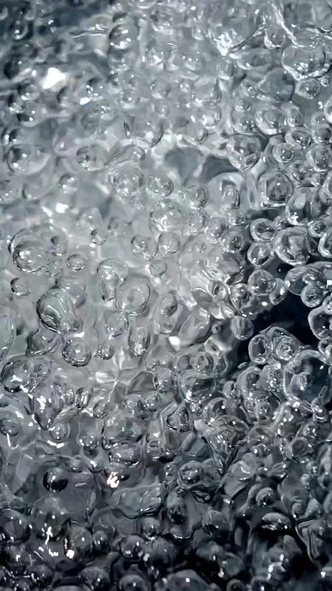 Bubbling water with air bubbles. Cavitation of water flow. Water texture. Stock Footage 337768128