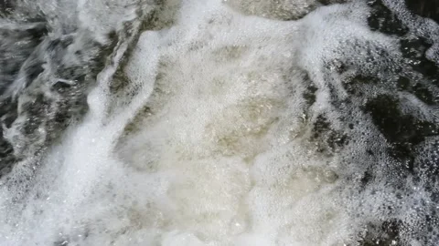 Bubbling water with foam on top Stock Footage 131664042