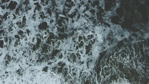 Bubbling waves of sea surf view from above Stock Footage 132174744