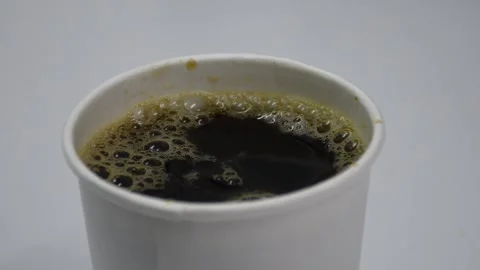Bubbly coffee, frothy coffee, steaming coffee with bubbles Stock Footage 305778073