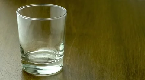 Bubbly cola beverage flowing into clear drinking glass with copy space. Stock Footage 62223728