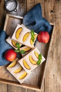 Bublanina, easy sponge cake with nectarine slices, dusted with powdered sugar Stock Photos