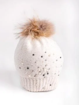 Bubon or pompon made of fur. Fluffy fury of pastel tones. Close-up, selecti.. Stock Photos