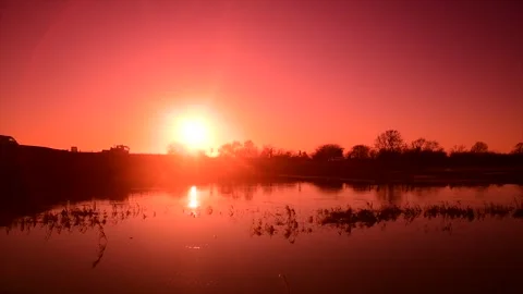 Bubwith,england January/19/2024 flooding at sunset Stock Footage 262075476