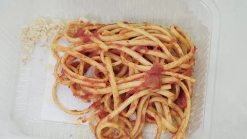 Bucatini pasta with tomato sauce in container Stock-Footage 336123093