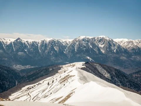 Bucegi Mountain range covered in snow in Romania. Winter landscape Stock Photos