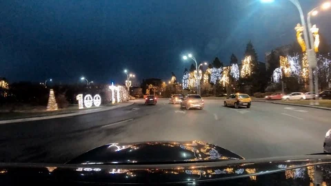Bucharest city centre streets hyperlapse time lapse moving car christmas lights 動画素材 100326655