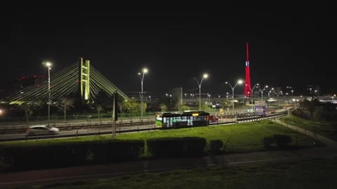 Bucharest night cityscape with Basarab overpass, public transit tramway and Video stock 336955077