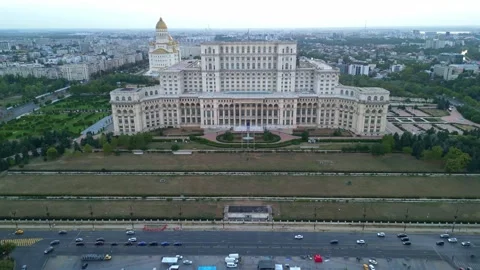 BUCHAREST, ROMANIA - AUGUST 13, 2025 View of Palace of the Parliament at Sunset Stock Footage 336015763